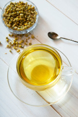 chamomile tea on white background