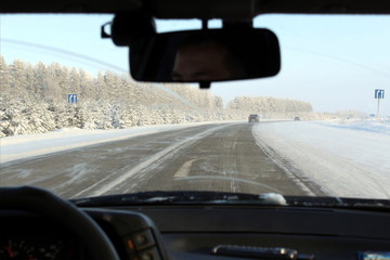 Winter track view from inside the car