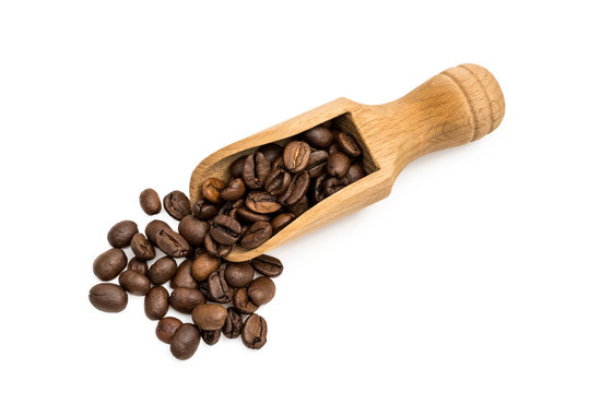 Small Wooden Spoon Or Scoop With Coffee Beans Seen From Above And Isolated On White Background