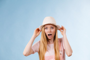 Shocked woman wearing summer outfit