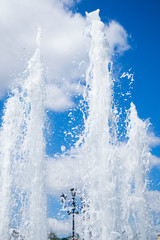 beautiful fountains against the blue summer sky
