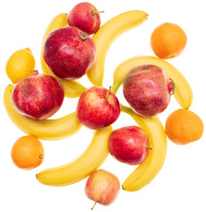 Ripe bananas and apple other fruits on white background