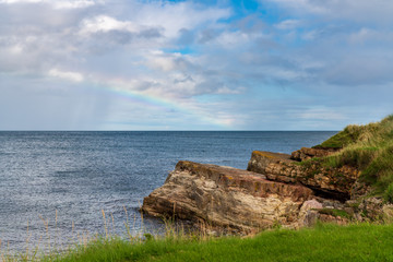 Rainbow over the North Sea, seen in Benthall, Northumberland, England, UK