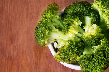 Cooked green broccoli with  salt and copyspace