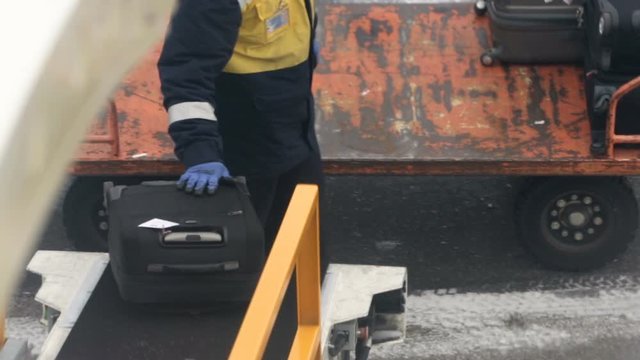Airport employee baggage airplane
