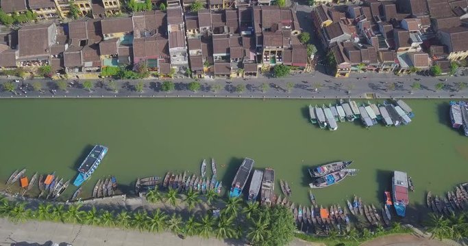 Aerial view panorama of Hoi An old town or Hoian ancient town. Royalty high-quality free stock video footage top view of Hoai river and boat traffic Hoian. Hoi An is the most popular travel in Vietnam