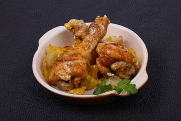 Roasted chicken legs with potato