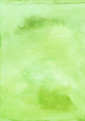 Light green watercolor background painted on textured paper. Greenery color trend backdrop. Bright green aquarelle template. Green watercolor paint stains on paper. Cards, invitations, wallpaper.