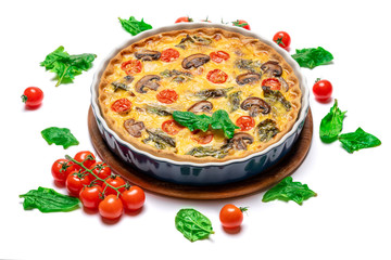 Baked homemade quiche pie in ceramic baking form