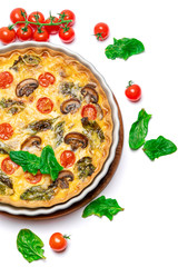 Baked homemade quiche pie in ceramic baking form