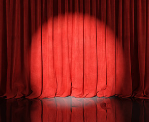 Red stage curtains with flash or spotlight. 