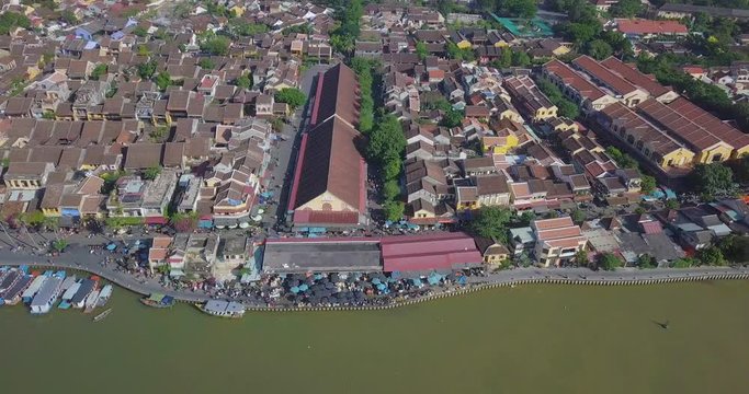 Panoramic of Hoian market. Aerial view of Hoi An old town or Hoian ancient town in sunny day. Royalty high-quality free stock video footage top view of Hoai river and boat traffic in Hoi An market