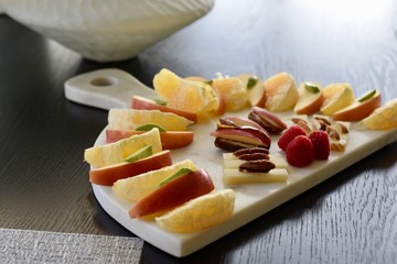 plate of fruit berries and dates