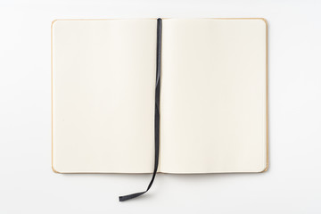 Top view of kraft paper notebook, page, bookmark