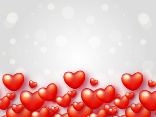 Glossy heart shapes decorated on bokeh background for valentines day celebration.
