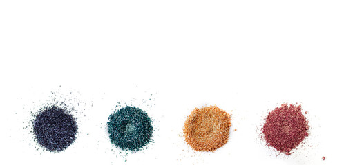 A set of color pigments in different shades, pigment powder close up, glitter eyeshadow / mica....