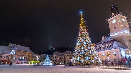 Council Square Brasov, Transylvania landmark, Romania. View from above at night, Black Church and Christmas tree are in the scene. Brasov, probably the best town in the world.