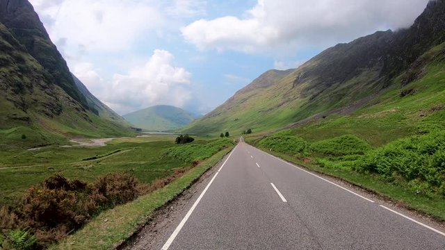 POV driving Glencoe mountains river Coe Scottish Highlands 