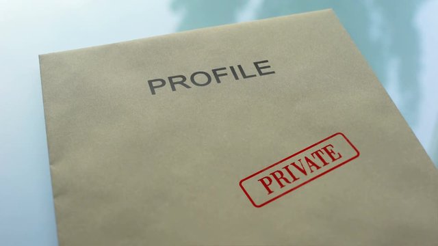 Profile private, hand stamping seal on folder with important documents