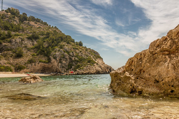 Fototapeta na wymiar View from the beach to the sea with rocks.