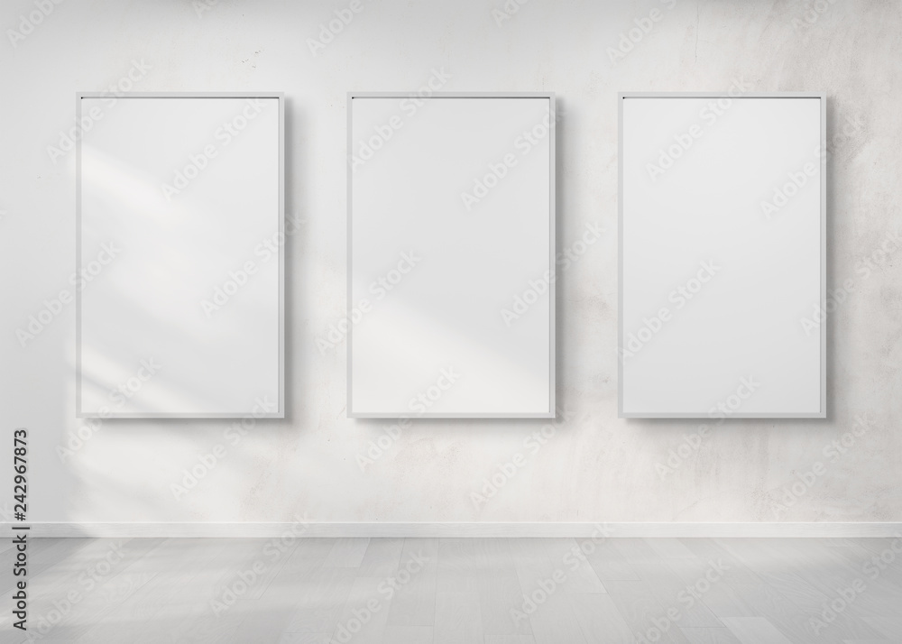 Poster Three frames hanging on a wall mockup 3d rendering