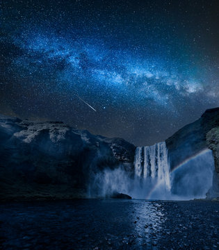 Fototapeta Stunning milky way and waterfall Skogafoss in Iceland at night