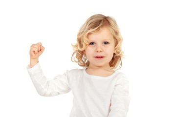 Child showing his strong bicep