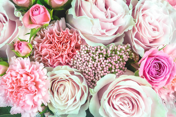 Flowers bouquet closeup. Decoration made of roses , carnation and decorative plants. 