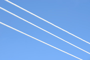 Electric communications wires covered with ice and snow. Snow-covered power cable lines and pole. Power electric transmission lines.