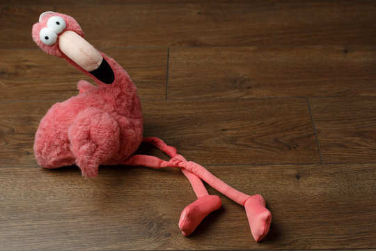 soft toy pink flamingo
funny toy flamingo on a wooden background
pink flamingo of cloth