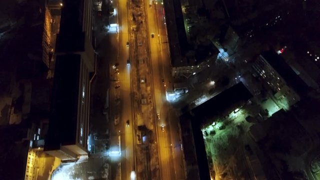 View drone night city with blue light ring road with yellow light of district 4K