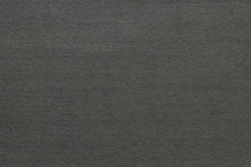 Soft grey felt material. Abstract background.Surface of felted fabric texture