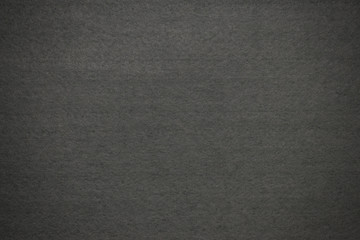 Fototapeta premium Gray surface of felt fabric texture