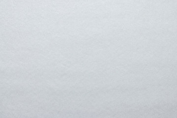 Textured background of white felt