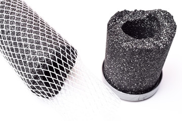 Carbon water filter cartridge isolated on white