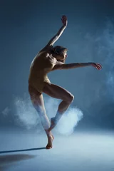 Poster Dancing in cloud concept. Muscle brunette beauty female girl adult woman dancer athlete in fog smoke fume wearing dance bodysuit making emotional dance element performance on isolated grey background © Monstar Studio