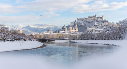 Panorama of Salzburg in winter: Snowy historical center, sunshine - obrazy, fototapety, plakaty
