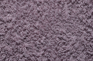 Pink carpet texture, background. Fabric, towel, textile, abstract. 