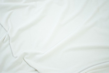 Fototapeta na wymiar white crumpled blanket, plaid, texture, background, top view