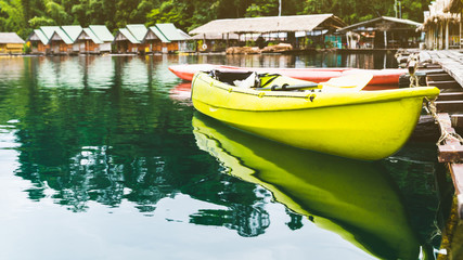 Vacations recreation kayak at floating raft resort, Cheow Lan Lake or Rajjaprabha Dam Reservoir, Surat Thani, Thailand.
