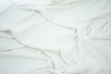 white crumpled blanket, top view