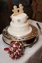 Gingerbread Men, Man and Woman with love hearts on a wedding cake