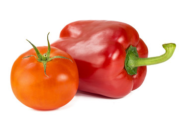 Fresh sweet pepper, tomato. On a white background
