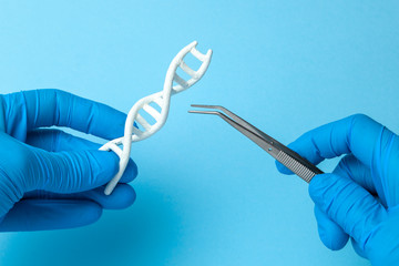 DNA helix research. Concept of genetic experiments on human biological code DNA. Scientist holding...
