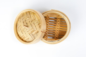 Wooden bamboo dim sum steamer on white background