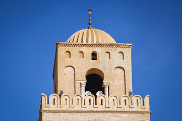 Fototapeta na wymiar Great Mosque of Kairouan minaret in Kairouan city in Tunisia also known as Mosque of Uqba