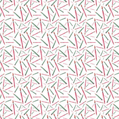 Fototapeta premium Seamless pattern of pencils and brushes green and red for use in packaging or fabric 
