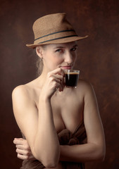 Portrait of a beautiful woman with cup of coffee.