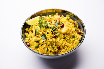 Aloo/Kanda Poha or Tarri Pohe with spicy chana masala/curry. selective focus