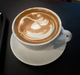 The cup with coffee latte